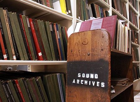 Music library shelves and cart