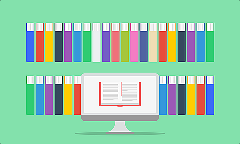 Books behind a computer monitor